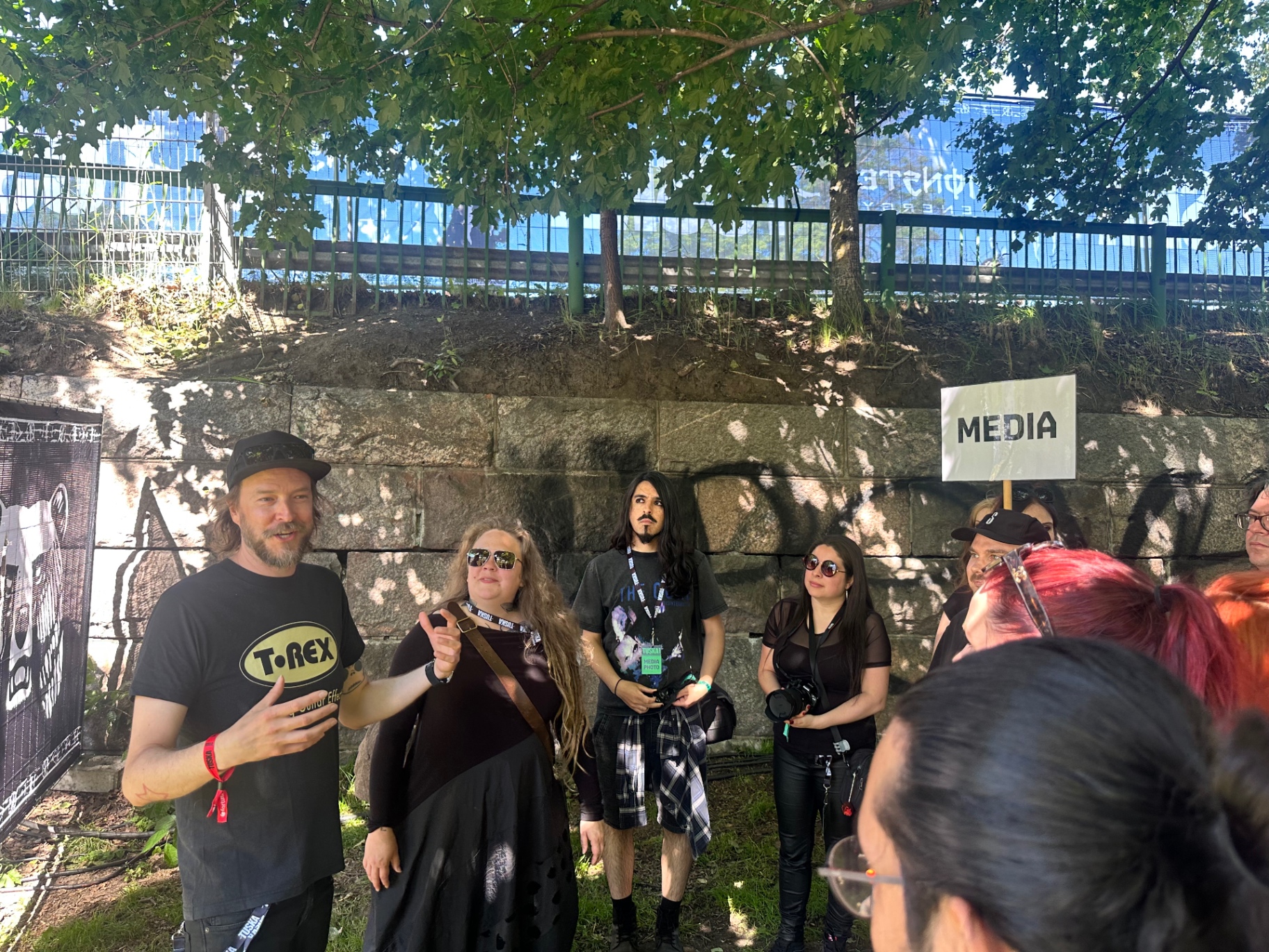 Day 2 — Official media tour briefing at the Tuska MEDIA point before heading backstage. Tuska Festival 2026 official media tour gathering at the MEDIA point in Suvilahti, Helsinki