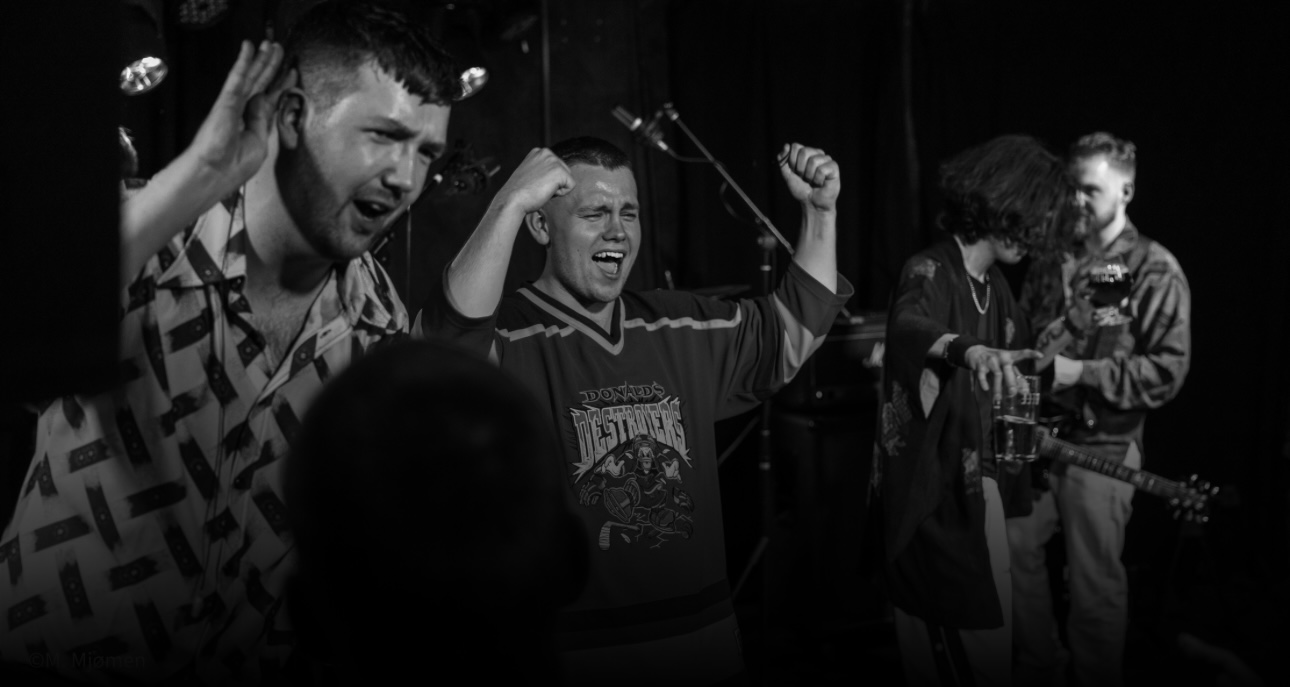 PROJECT: Beyond live PROJECT: Beyond live on stage: energetic black-and-white performance photo