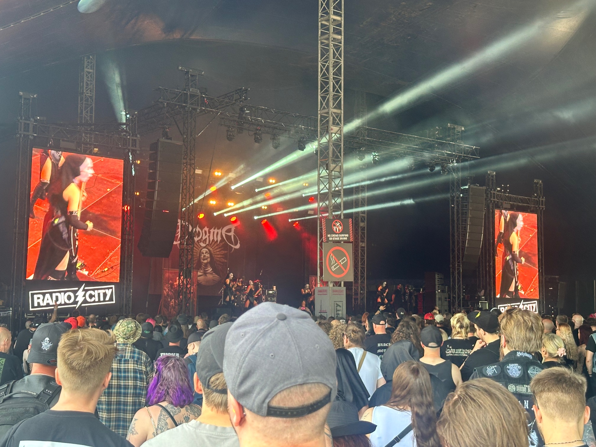 Dogma brought ritual energy and a fierce crowd reaction to Day 2 at Tuska. Dogma performing live at Tuska Festival 2026 with red lights and a packed crowd