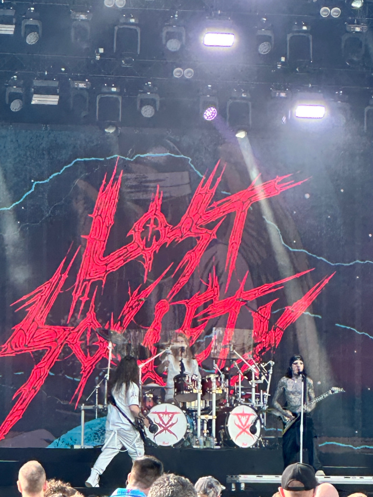 Lost Society — full-scale red logo backdrop, full-scale thrash. Lost Society close-up with red band logo backdrop, Ruisrock 2026